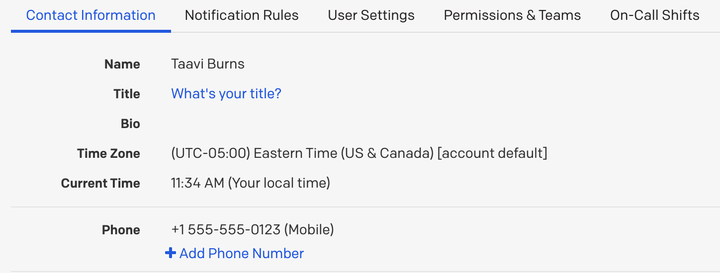 The Contact Information page in PagerDuty, showing a
            configured phone number